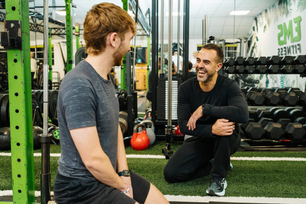 xavi gomez coaching a young bright handsome man